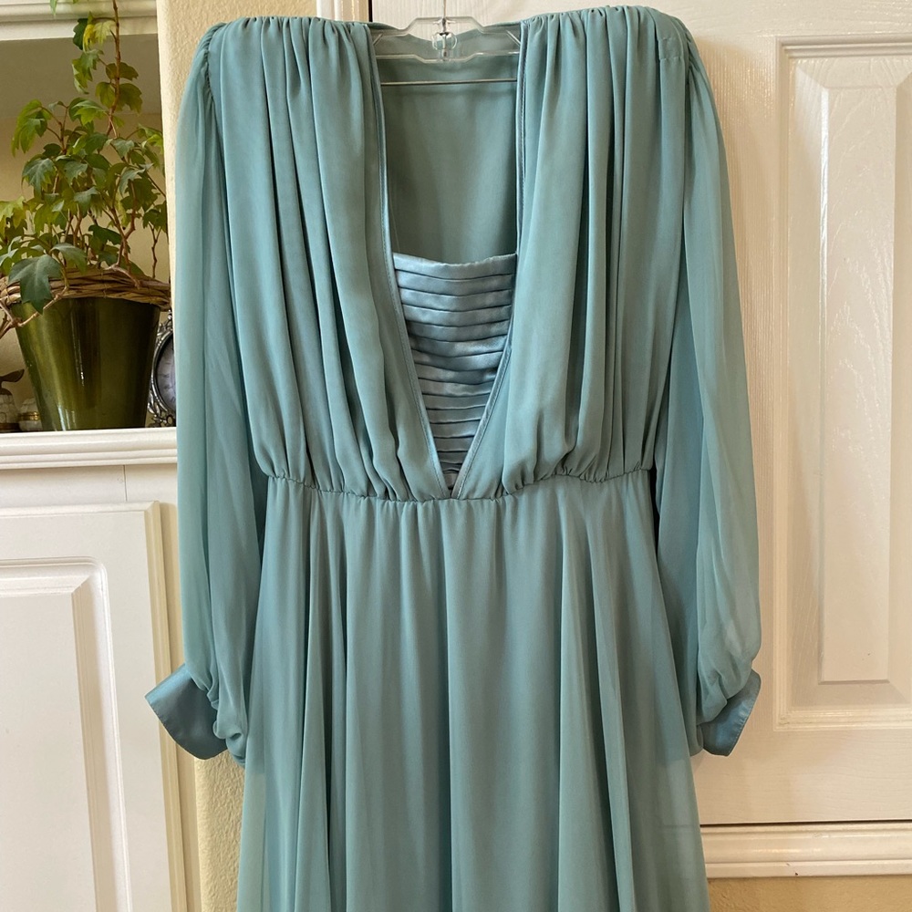 Sage green satin and tulle cocktail dress with poet sleeves pearl buttons